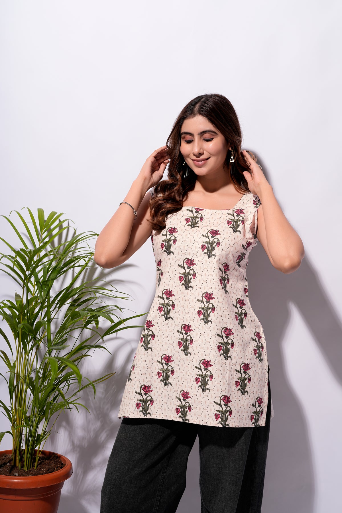 Cream Floral Sleeveless Short Kurti