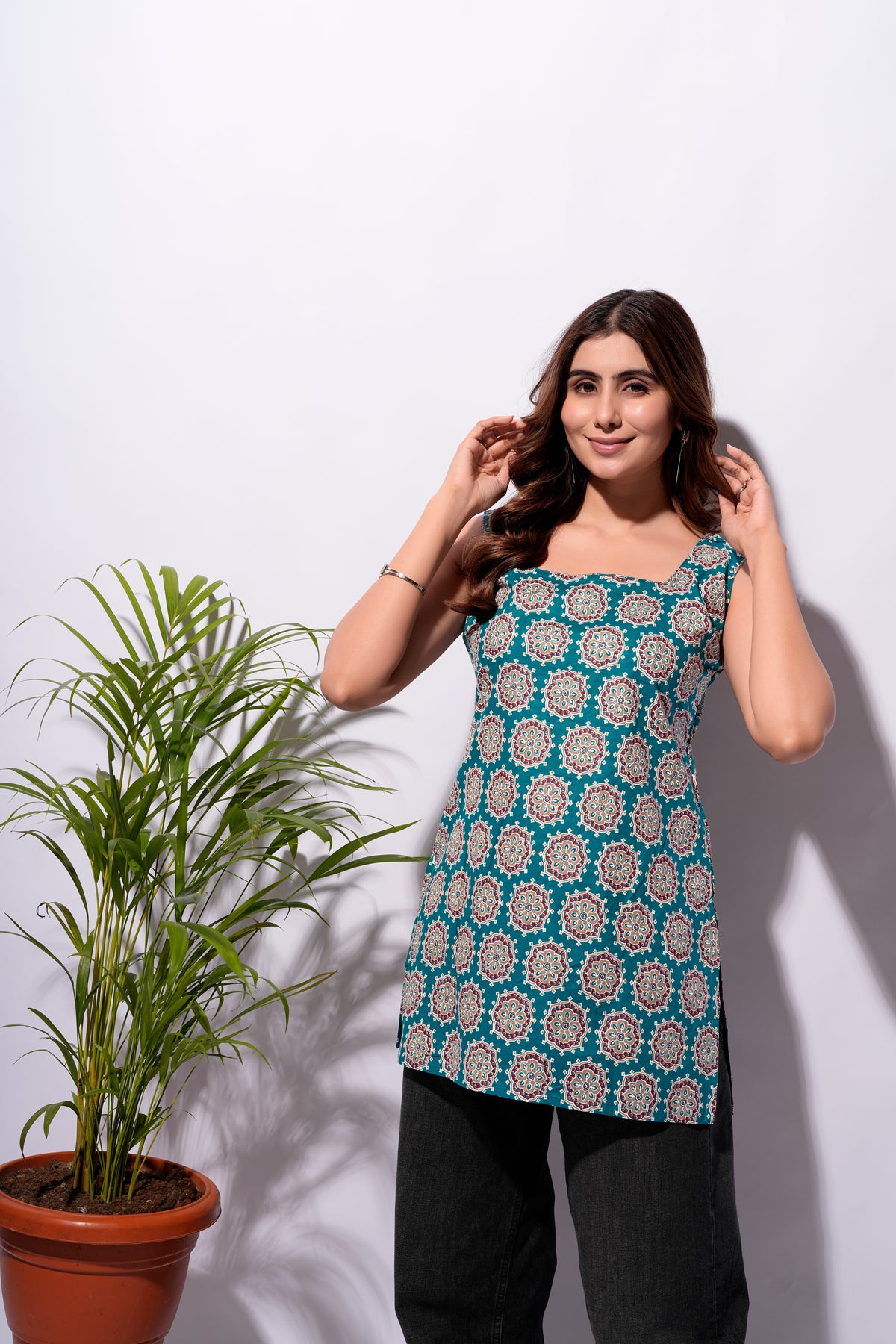 Teal Printed Sleeveless Short Kurti