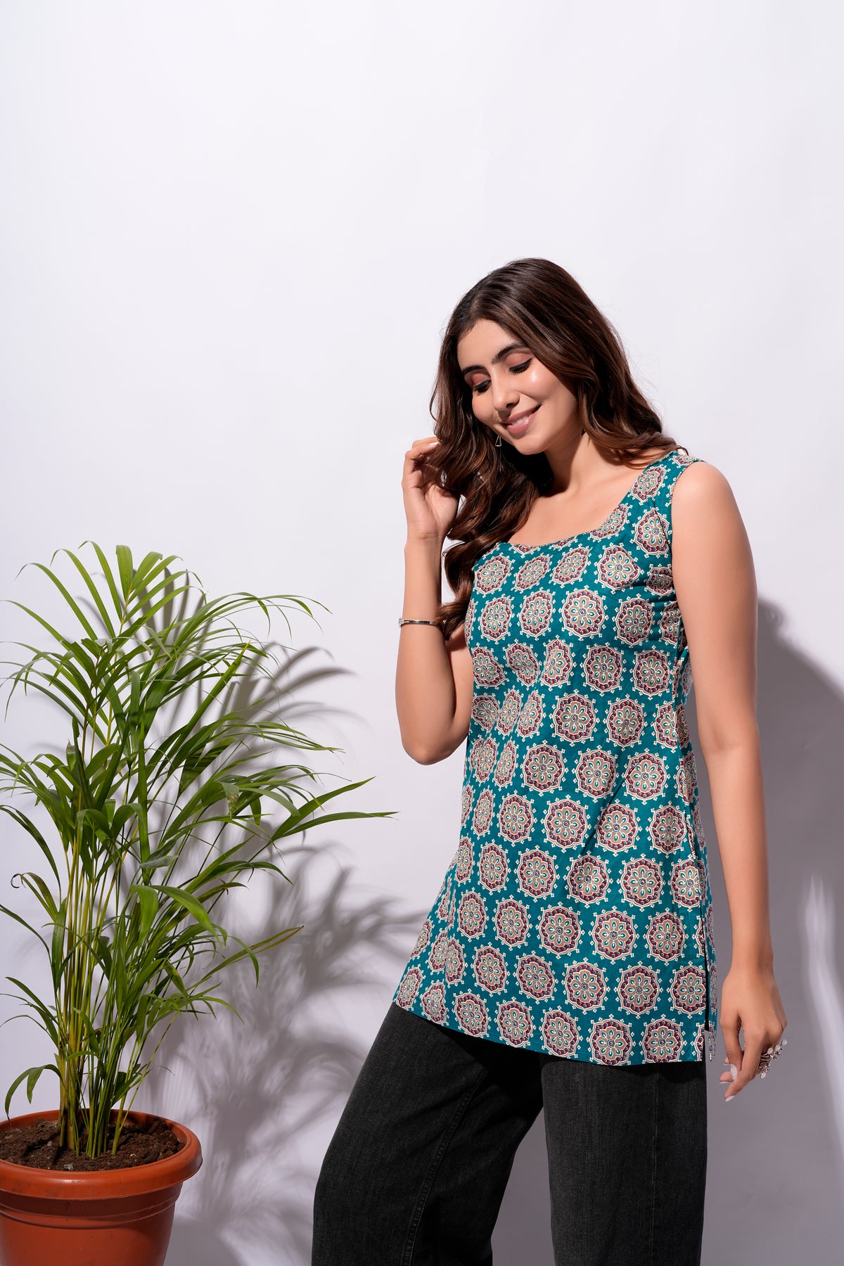 Teal Printed Sleeveless Short Kurti